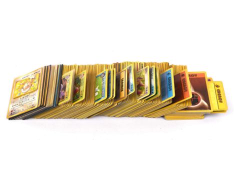 Pokemon TCG - A large lot of approximately 200-300 non-holo Vintage English and Japanese Pokémon cards from mixed sets and pr