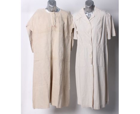 A quantity of vintage workwear, comprising two late 1940s white cotton dresses, a white coat, four pairs of cotton trousers f