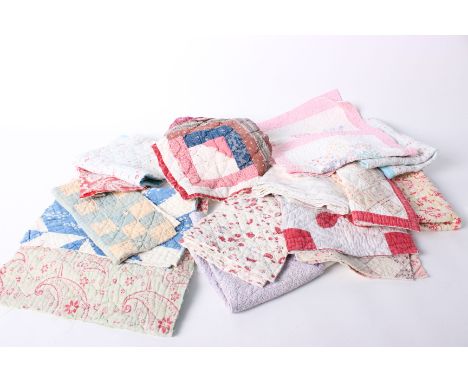 Late 19th and early 20th Century French and English patchwork quilt and eiderdown scraps, some with fading and damage, but us