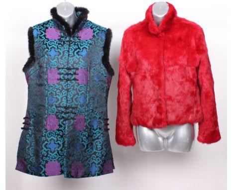 A dyed red rabbit fur jacket; a modern fur trimmed Oriental waistcoat, a vintage three quarter length jacket, a white mink ha