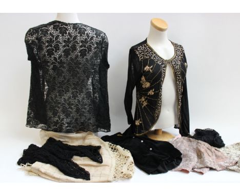 A 1940s pink lamé bolero jacket; two black silk velvet evening jackets, 1930s black lace jacket, a cream lace blouse with gol