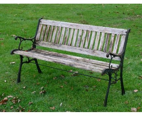 Slatted garden bench with metal supports   Condition: 