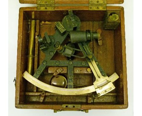 Late 19th/early 20th Century brass and silvered mounted sextant by Troughton & Simms of London, cased   Condition: 