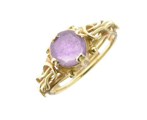 Dress ring set purple stone in a claw setting with reef knot shoulders, size K   Condition: 