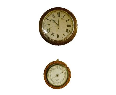 Early 20th Century oak cased circular wall clock by Garrard, off-white dial with Roman numerals together with an early 20th C