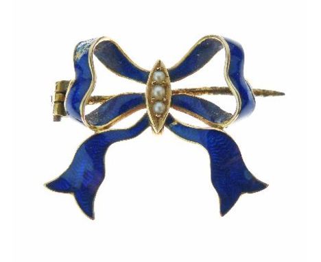 Gold coloured metal and blue enamel decorated bow design brooch set three seed pearls   Condition: 