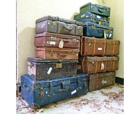 Five vintage cabin trunks together with six vintage suitcases and a tin box   Condition: 