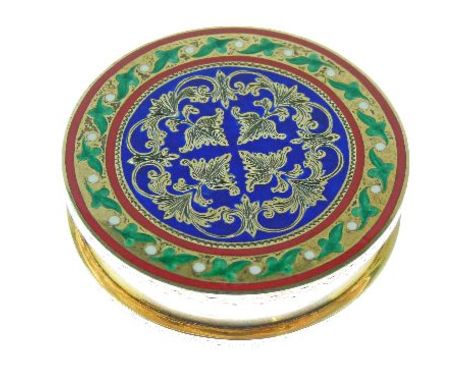 Good quality Continental silver gilt and polychrome enamel circular box having a hinged cover and decorated with stylised fol