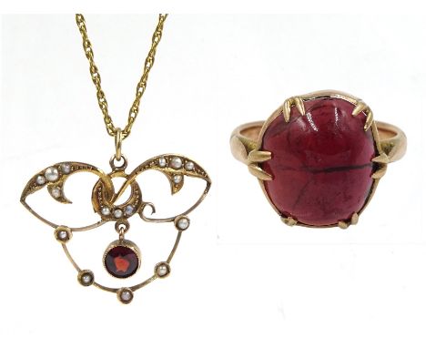 9ct gold garnet and seed pearl pendant hallmarked, on 9ct gold chain and a rose gold cabochon garnet ring, stamped 9ct - Cond