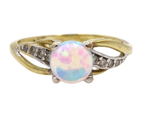 Gold opal and cubic zirconia ring, stamped 9K - Condition Report Approx 1.6gm, size L-M