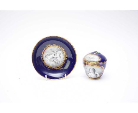 A Meissen chocolate cup and cover with matching saucer19th centuryof single-handled form, the cobalt ground decorated with mo