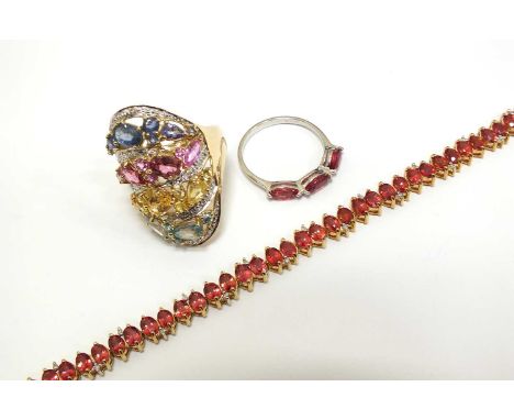 A 9ct gold orange sapphire and diamond bracelet, 18.5cm long, together with a 9ct gold ruby and diamond ring and a 9ct gold m