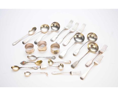 A collection of silver flatware, comprising; three table forks, two dessert forks, three sauce ladles, two cruet spoons, a co