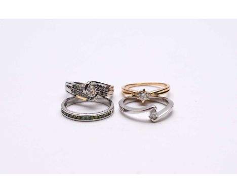 A 14ct white gold single stone diamond ring with diamond set crossover shoulders, together with a 14ct white gold treated gre