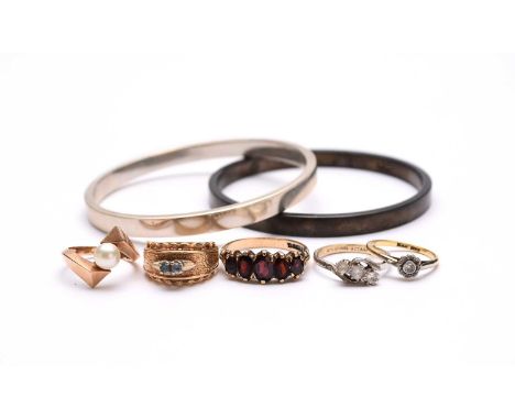 A small collection of jewellery, comprising; a 9ct gold graduated five stone garnet ring, size W, together with a single cult