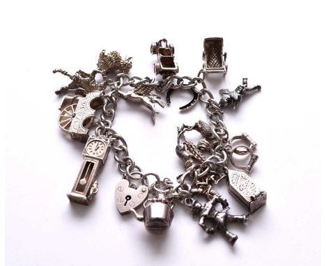 A silver charm bracelet, with attached charms to include; a pram, a car and a longcase clock, weight approx 70g