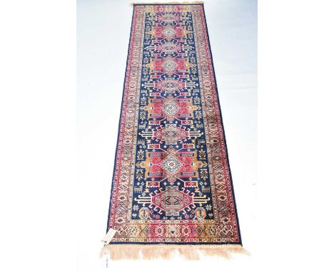 A Heriz runner, 70cm x 228cm