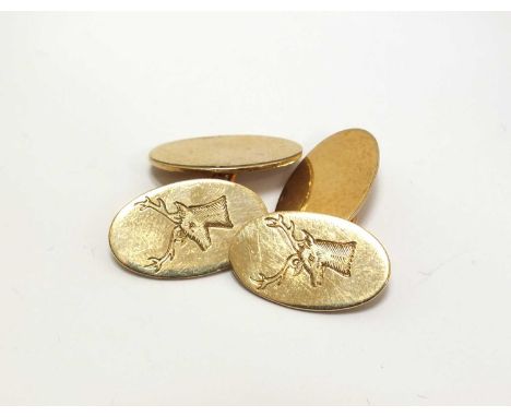 A pair of 9ct gold cufflinks, each with engraved crest, total weight approx 7.8g