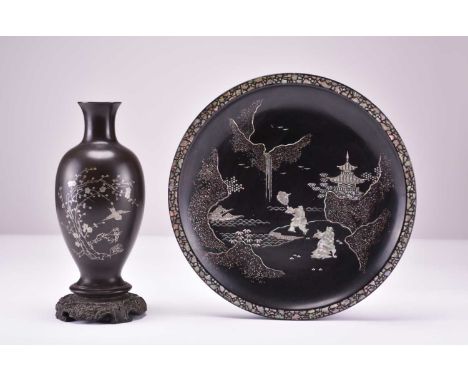 A Chinese lacquer dish and vase, late Qing DynastyThe dish of plain circular form and inlaid with mother-of-pearl forming a s