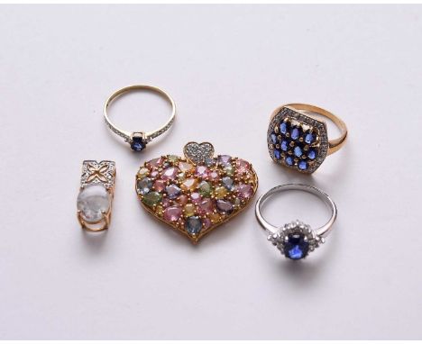 An 18ct gold sapphire and diamond cluster ring, together with a 9ct gold sapphire and diamond panel ring and a further 9ct go