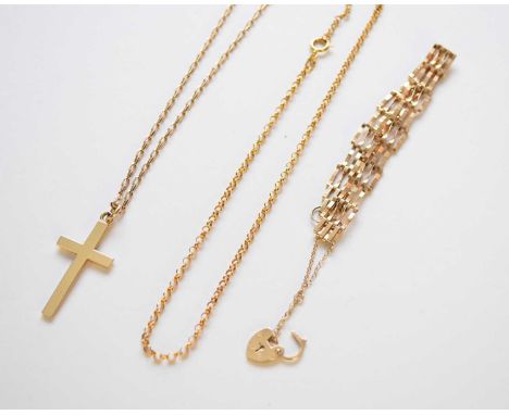 A 9ct gold gate link bracelet, with heart shaped padlock clasp, together with a 9ct gold crucifix pendant on chain and two 9c