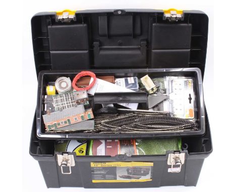 Toolbox containing a selection of N Gauge spares, parts and track, mixed brands to include Graham Farish, Bachmann and others