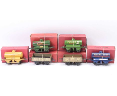 Hornby – 4 tank wagons and two LMS open wagons. 1934-41 Castrol embossed top (E-BVG); 1936-41 Esso tank, cream (E) incorrect 