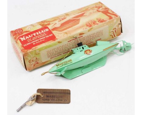 Sutcliffe Models, Nautilus Submarine, clockwork, light green body with gold detailing, with original bung and key, in the ori