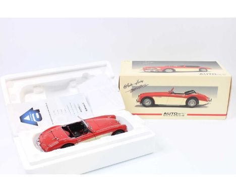 Auto Art Millenium No.70721 1/18th scale model of a Austin Healey 3000Z, finished in cream and orange, housed in the original