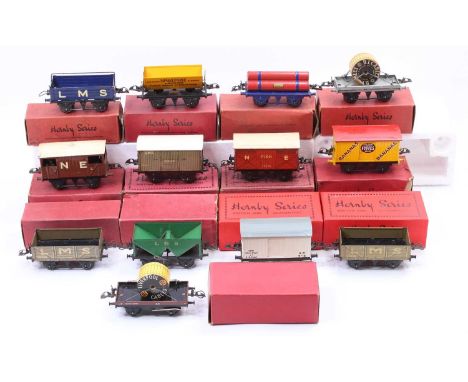 Thirteen boxed Hornby 4-wheel wagons, mix of pre &amp; post war. Includes two LMS open; LMS ‘B’; Hudson side tipper; BR refri