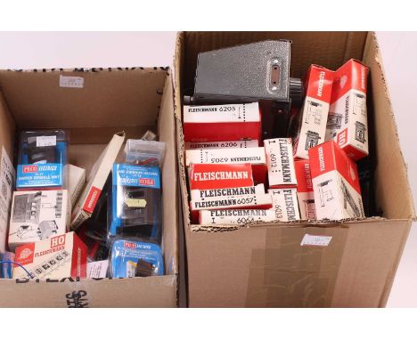 Two boxes containing many Fleischmann items used in controlling model rail layouts, contents of boxes not checked, includes S