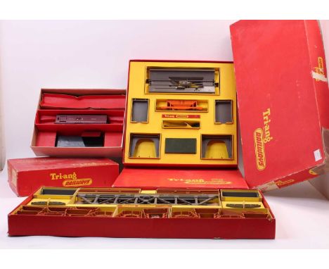 Three boxed Triang items: R161 Operating Hopper Car set (E-BE); R323 Operating Royal Mail Coach set (VG-BE); R432 girder Brid