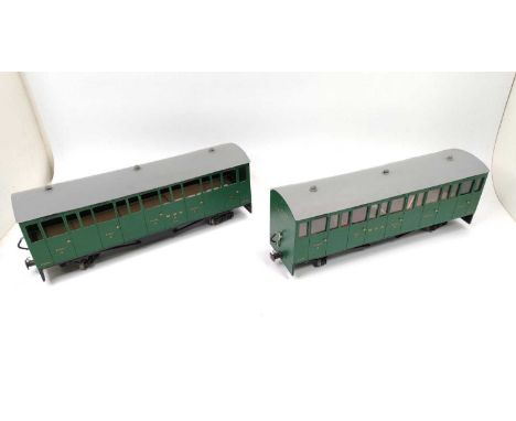 A pair of G scale MDR and Co Fusion Special Passenger coaches, constructed from wooden and metal components, with 4 wheels bo