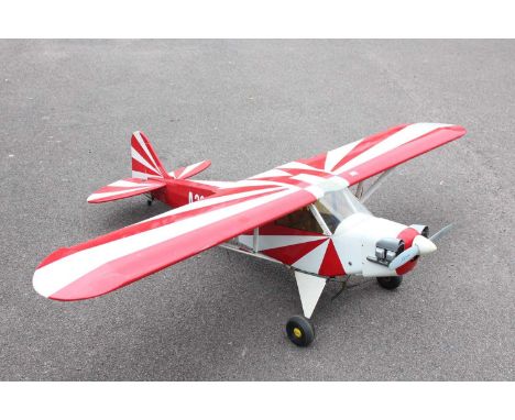 A very well made kit-built radio controlled and four stoke model aircraft, constructed from balsa wood and other wooden compo