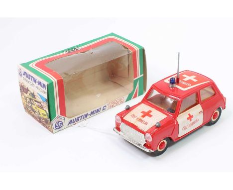 Pepe of Spain, plastic and friction drive model of a Austin Mini C Emergency Services Vehicle, comprising red body with brown