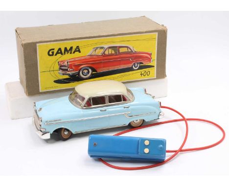 Gama No.400 tinplate and battery-operated model of an Opel Kapitan saloon, comprising light blue body with cream roof and det