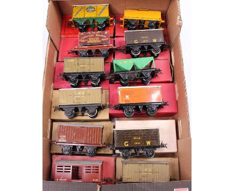 Large tray containing twelve pre &amp; post-war 4-wheel wagons including vans, cement, hopper, cattle &amp; flat. (F-G) Most 
