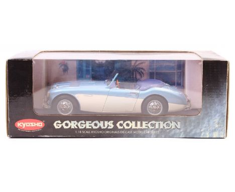 Kyosho No.08144BW 1/18th scale diecast model of a Austin Healey 100, finished in blue and white, housed in the original windo