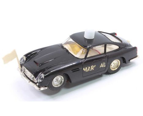 Scalextric 1/32 scale No. C68 Aston Martin DB 4 GT "Marshal" Car comprising a black body with a white interior, driver figure