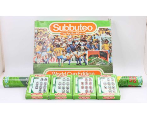 A boxed Subbuteo World Cup 1986 edition to include the teams Mexico and Italy as well as some pitch accessories - the set is 