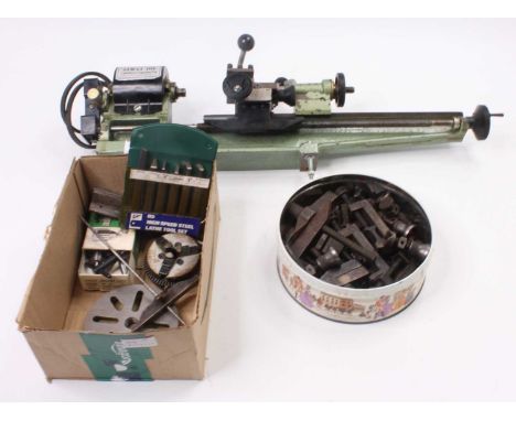 Simat 101 Alpha Beta Engineering table top lathe and accessories, to include face plate, drill bits, sealed tools and spares