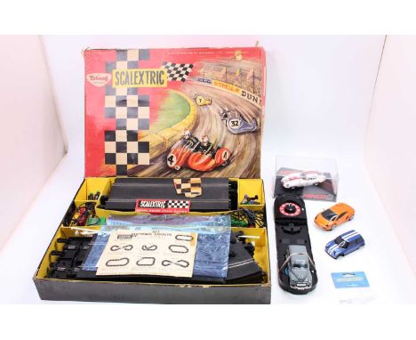 A Scalextric boxed set No. MC31 model motorcycle racing comprising 2x Motorcycle with sidecars, track, hand controllers, barr