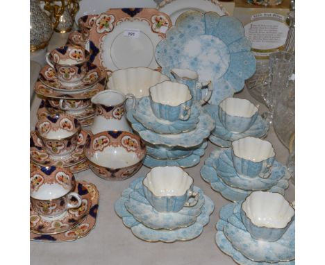 Teawares - a Staffordshire part tea service, in the Imari palette; another; a pair of Staffordshire creamware plates