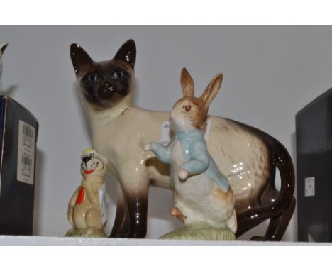 A John Beswick Peter Rabbit, brown back stamp ; a Wade Whimsie Yogi Bear; a Beswick Siamese cat 