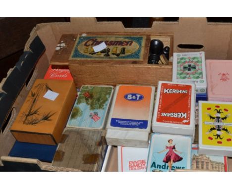 A boxed chess set; playing cards (1 box)
