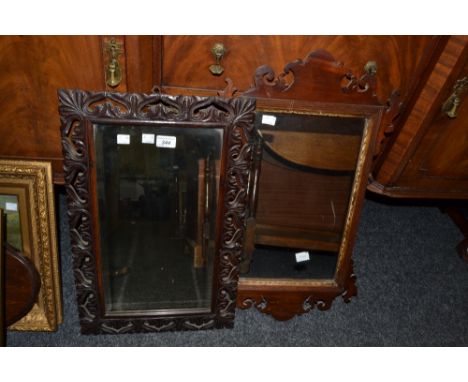 A 19th century mahogany Vauxhall mirror;  another, carved (2)