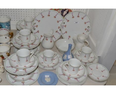 An early 20th century Austrian porcelain tea service for nine, decorated with flowers;  a Wedgwood plate, Jasperware etc 