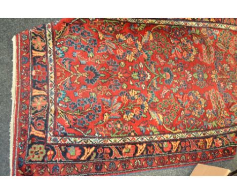 A vintage Persian lilean runner, 284cm x 107cm, approx.