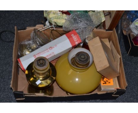 A Victorian brass oil lamp; various oil lamp chimneys , tape; etc (1 box)