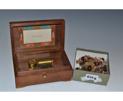 A Swiss Reuge cylinder music box, 4cm cylinder, steel comb, hardwood case, playing Dr Zhivago; a hardstone necklace(2)